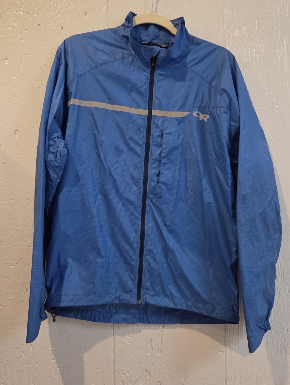 Outdoor Research Men’s Bright Blue Packable Windbreaker with Reflective Stripe